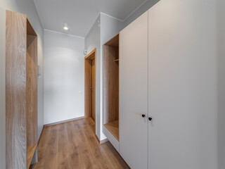 The interior of an apartment in a modern residential building in a European city.