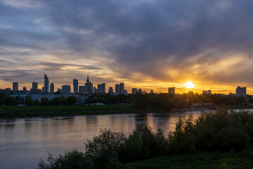 Fototapeta premium Golden Hour Glow: Warsaw's Waterfront