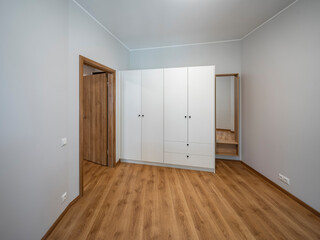 The interior of an apartment in a modern residential building in a European city.