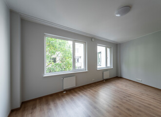 The interior of an apartment in a modern residential building in a European city.