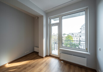 The interior of an apartment in a modern residential building in a European city.