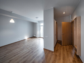 The interior of an apartment in a modern residential building in a European city.