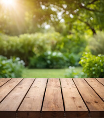 Wooden table top on blur background of green garden with bokeh sunlight. High quality photo	