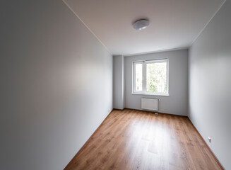 The interior of an apartment in a modern residential building in a European city.