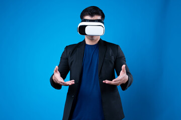 Profile of businessman wearing VR device connecting metaverse, holding stuff in the air isolated...