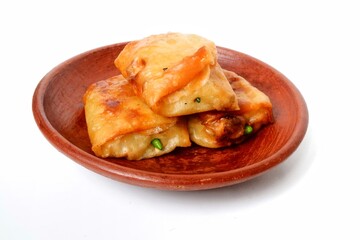 Indonesian Martabak Telur is Savory pan-fried pastry stuffed with egg, meat and spices. Martabak Telur is one of Indonesia street food