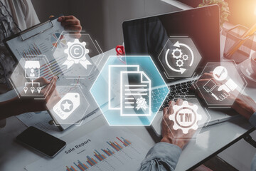 Assets business concept, Business team analyzing income charts and graphs on office desk with franchises, copyright, brand, software, trademarks and goodwill icon on virtual screen.