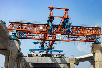 A construction of elevated precast segmental bridge over highway in Bangkok, Thailand