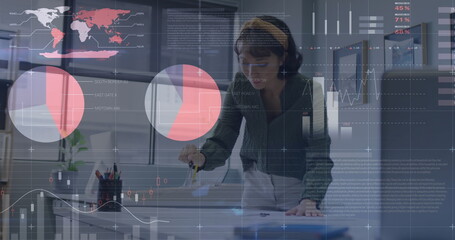 Image of statistical data processing over asian woman using compass working on a plan at office