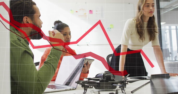 Image of statistical data processing against team of diverse colleagues discussing at office