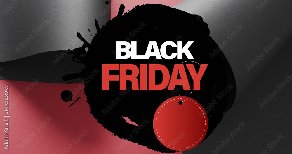 Poster image of black friday text with red tag over rolled up black paper on red background