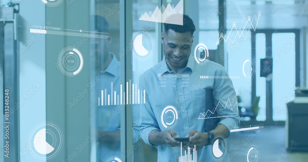 Poster image of statistical data processing against biracial man using smartphone smiling at office