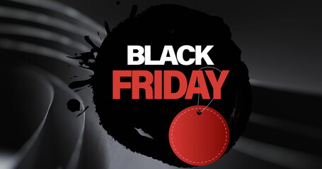 Image of black friday text with red tag over rolled up black paper on black background