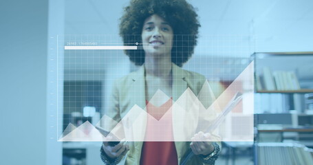 Image of statistical data processing against african american woman walking in office corridor