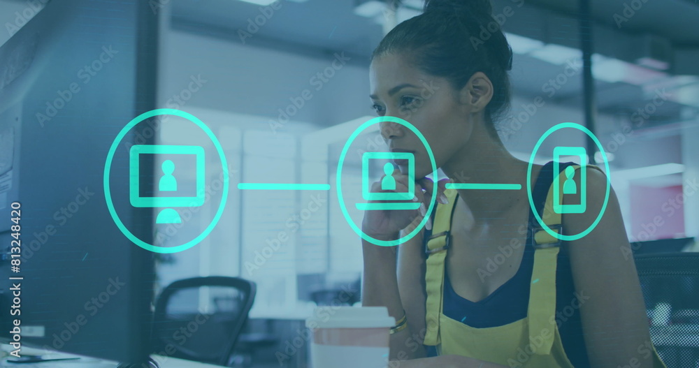 Poster image of statistical data processing against biracial woman using a computer at office