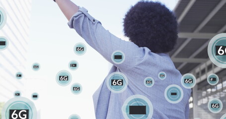 Image of multiple 6g texts over rear view of biracial man raising hands to stop cab