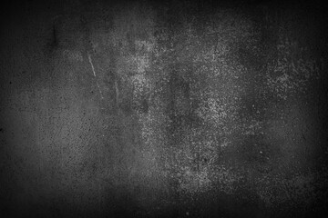 Background and wallpaper or texture of Wall with old black stains gives a dark mood.