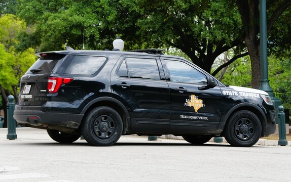 Austin, Texas, U.S.A - April 9, 2024 - The black State Trooper vehicle of the Texas Highway Patrol and Public Safety