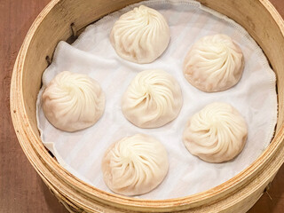 Steamed Dumplings Delight in Traditional Bamboo Steamer