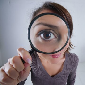 woman with magnifying glass
