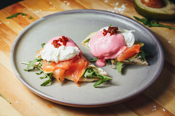 Elegant Eggs Benedict: Salmon and Avocado Delight
