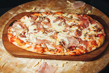 Delectable Ham and Cheese Pizza on Wooden Board