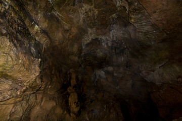 Speleology. The Bacho Kiro cave, Dryanovo, Bulgaria. Stalactite, and stalagmite speleothem formations.
