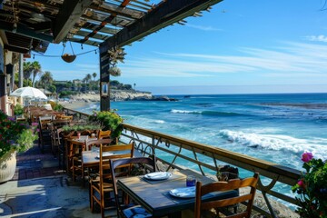 A charming seaside cafe with tables overlooking the ocean
