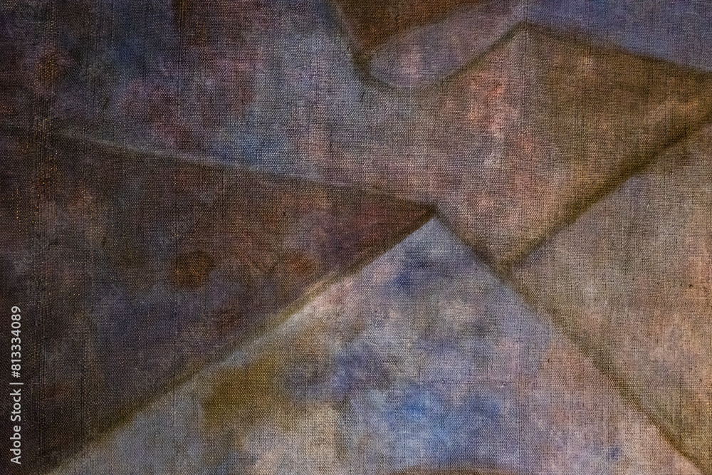 Poster a piece of fabric with a pattern of squares and triangles