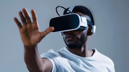 African boy feels happy playing with VR glasses