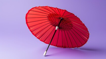 red cocktail umbrella isolated on purple background