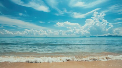 Fototapeta premium A beautiful beach with a peaceful view of the sea and sky. Tropical beach for relaxing holidays
