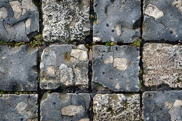 Ancient grey stone wall texture with rough, textured surface, cobblestone pattern, perfect for abstract backgrounds