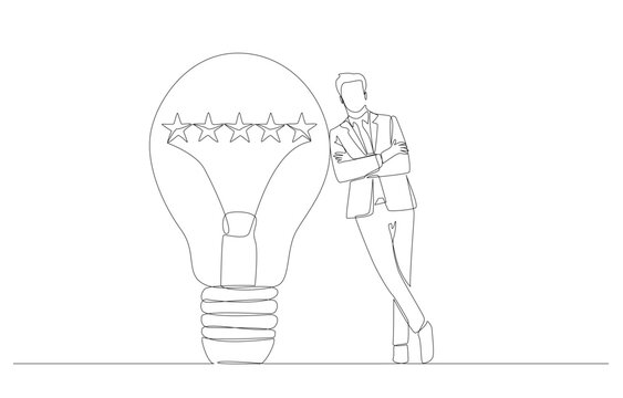 businessman leaning on lightbulb with stars