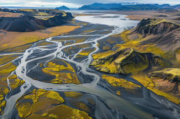 waters in Iceland, showcasing the contrast between dark black basalt and light yellow soil on one side with greenishblue braided rivers leading to white lakes on another - Powered by Adobe
