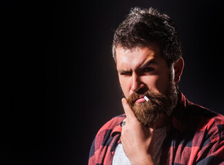 Bearded man smoke cigarette. Long beard. Hair style hair stylist. Barber shop design. Advertising and barber shop concept. Bearded man portrait. Barber and barbershop concept.