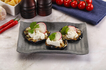 Grilled eggplant with cheese and radish