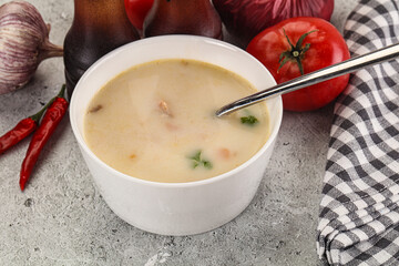 Salmon cream soup with vegetables