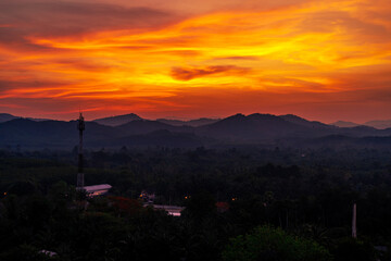 Blurred nature background of sky lights Evening with colorful lights A bright twilight of pinks and oranges, with a cool breeze blowing through.