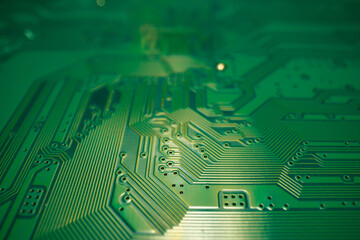 Circuit board. Technological electronic plate with roads and other components, selective focus. Technology background, electronics texture.