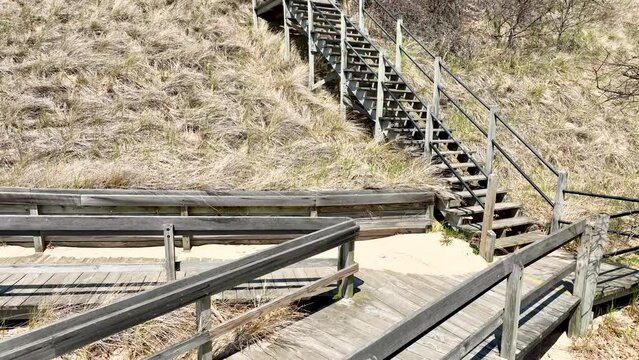 Pulling away with drone from a walkway.