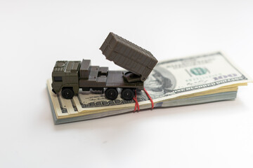 concept four rockets sent upwards against a hundred dollar banknote money background. Weapons of mass destruction, nuclear warhead, chemical charge. armament