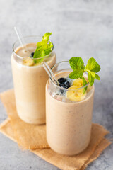 selective focus of healthy food Oats Banana Smoothie. 