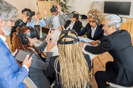 Diverse Corporate Team Engaging in Virtual Reality Experience