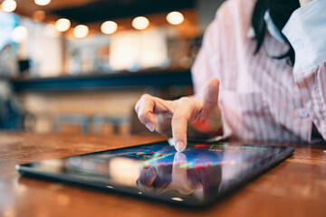 Hands of a woman using smartphone buy cryptocurrency, blockchain investment, decentralize and Stock market concept