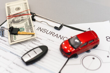 Car insurance form with car key
