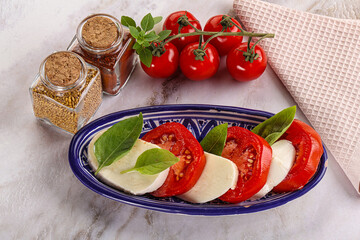 Italian caprese salad with mozzarella