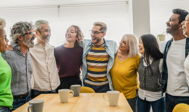 United in Joy: A Multicultural Team Shares a Lighthearted Moment