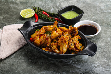 Vietnamese cuisine - fried frog with vegetables