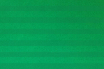 マスキングテープで作った横縞模様の芝生風の緑の背景素材